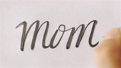 how to write mom in cursive: exploring the art of calligraphy through motherhood